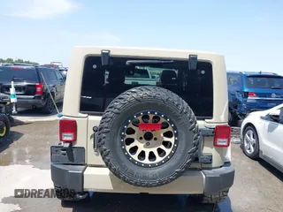 2018 Jeep Wrangler Sahara z VIN 1C4AJWBGXJL811092, wystawiony jako IAAI lot #42305620 z przebiegiem 41 021 mil mil oraz . Historia ofert i sprzedaży dostępna na DreamBid. Obrazek 16.