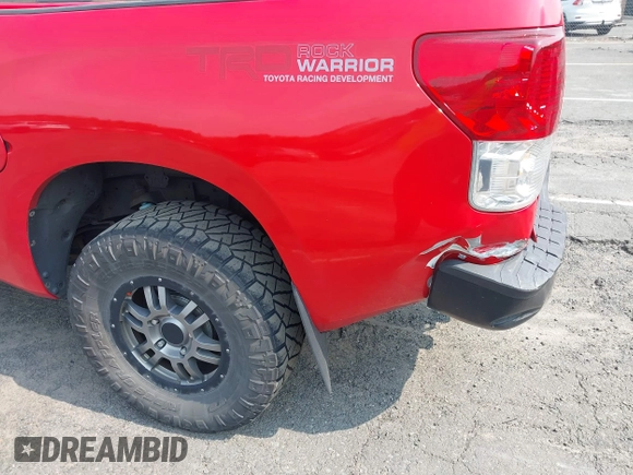 2012 Toyota Tundra z VIN 5TFUY5F16CX231794, wystawiony jako IAAI lot #42454478 z przebiegiem 249 756 mil mil oraz . Historia ofert i sprzedaży dostępna na DreamBid. Obrazek 18.