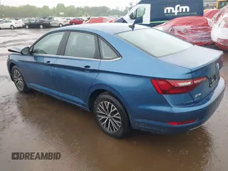2021 Volkswagen Jetta S with VIN 3VWC57BU9MM054792, listed as a IAAI auction lot 42244993 with 12,494 mi miles and . Bid and sale history available at DreamBid. Image 3.