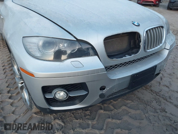 2012 BMW X6 50i z VIN 5UXFG8C58CL590171, wystawiony jako IAAI lot #41087730 z przebiegiem 83 143 mil mil oraz . Historia ofert i sprzedaży dostępna na DreamBid. Obrazek 6.