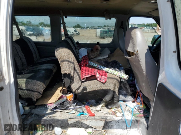 2002 Ford Econoline Passenger XL с VIN 1FBSS31L02HB56870, выставлен на аукционе Copart как лот 59566015 с пробегом 257 785 миль миль и Списание • Salvage title. История ставок и продаж доступна на DreamBid. Изображение 11.