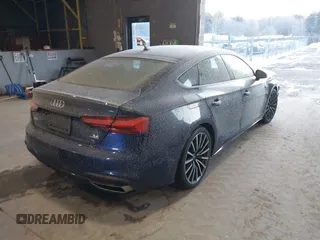 2022 Audi A5 Sportback Premium Plus z VIN WAUCBCF57NA005917, wystawiony jako IAAI lot #41362046 z przebiegiem 28 224 mil mil oraz . Historia ofert i sprzedaży dostępna na DreamBid. Obrazek 4.