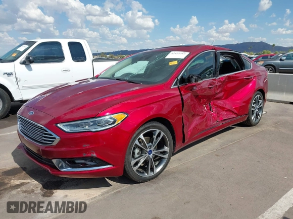 2017 Ford Fusion Titanium with VIN 3FA6P0K98HR207447, listed as a IAAI auction lot 42422213 with 59,549 mi miles and . Bid and sale history available at DreamBid. Image 2.