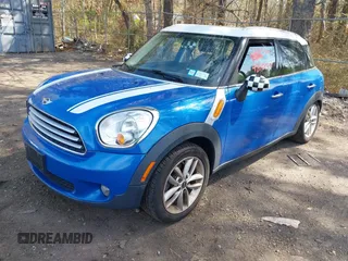 2014 MINI Countryman with VIN WMWZB3C59EWR37439, listed as a IAAI auction lot 42110149 with 181,661 mi miles and . Bid and sale history available at DreamBid. Image 2.