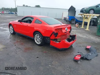 2012 Ford Mustang Premium with VIN 1ZVBP8AM7C5252191, listed as a IAAI auction lot 42498076 with 180,727 mi miles and . Bid and sale history available at DreamBid. Image 3.