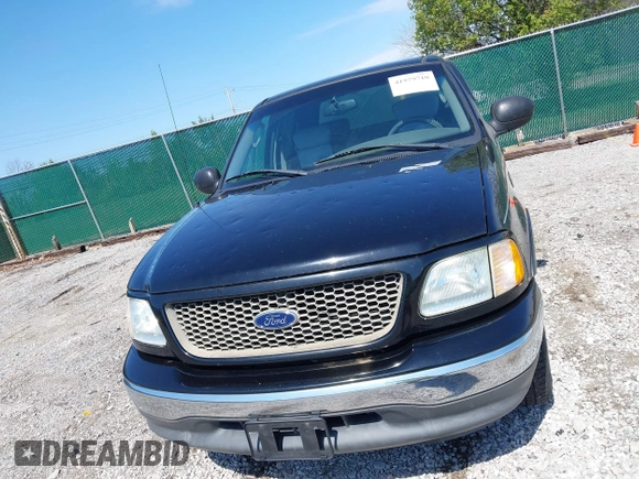 2003 Ford F-150 XLT with VIN 1FTRW07653KC18900, listed as a IAAI auction lot 41979710 with 99,525 mi miles. Bid and sale history available at carsss.com. Image 6.