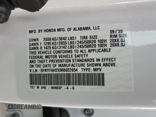 2021 Honda Pilot Special Edition z VIN 5FNYF6H2XMB022654, wystawiony jako Copart lot #58832335 z przebiegiem 32 493 mil mil oraz Szkoda całkowita • Salvage title. Historia ofert i sprzedaży dostępna na DreamBid. Obrazek 13.
