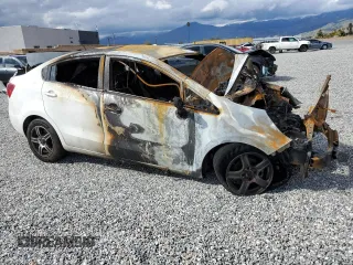 2014 Kia Rio LX with VIN KNADM4A34E6343790, listed as a Copart auction lot 46952313 with Not Provided miles and Non Repairable. Bid and sale history available at DreamBid. Image 4.