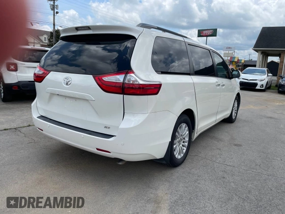 2016 Toyota Sienna XLE with VIN 5TDYK3DC3GS761177, listed as a Copart auction lot 61506935 with 134,732 mi miles and Clean title. Bid and sale history available at DreamBid. Image 4.