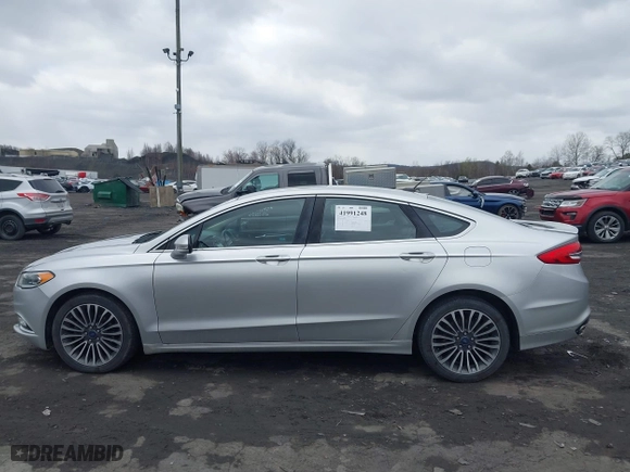2018 Ford Fusion Titanium with VIN 3FA6P0D99JR139114, listed as a IAAI auction lot 41991248 with 142,324 mi miles. Bid and sale history available at carsss.com. Image 14.