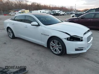 2017 Jaguar XJ with VIN SAJWJ2GD5H8W08395, listed as a IAAI auction lot 41014883 with 80,584 mi miles. Bid and sale history available at carsss.com. Image 1.