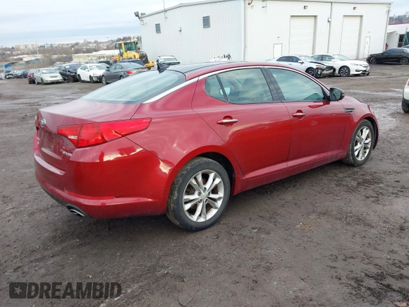 2013 Kia Optima EX z VIN 5XXGN4A78DG141924, wystawiony jako IAAI lot #41474952 z przebiegiem 172 814 mil mil oraz . Historia ofert i sprzedaży dostępna na DreamBid. Obrazek 4.