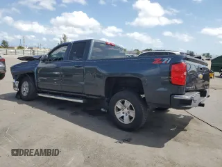 2018 Chevrolet Silverado 1500 LT with VIN 1GCRCREH5JZ261185, listed as a Copart auction lot 51847875 with 103,082 mi miles and Salvage Title. Bid and sale history available at DreamBid. Image 2.