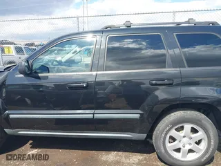 2009 Jeep Grand Cherokee Laredo with VIN 1J8GR48K99C550822, listed as a IAAI auction lot 41868508 with 179,436 mi miles. Bid and sale history available at carsss.com. Image 15.