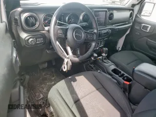 2022 Jeep Wrangler Sport S with VIN 1C4GJXAG5NW259605, listed as a Copart auction lot 57659775 with 14,864 mi miles and Salvage title. Bid and sale history available at DreamBid. Image 8.