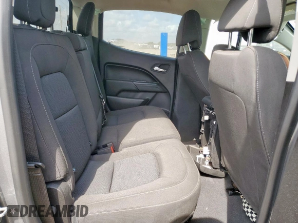 2019 Chevrolet Colorado 2WD LT z VIN 1GCGSCEN1K1133507, wystawiony jako Copart lot #58332065 z przebiegiem Nie podano mil oraz Szkoda całkowita • Salvage title. Historia ofert i sprzedaży dostępna na DreamBid. Obrazek 10.