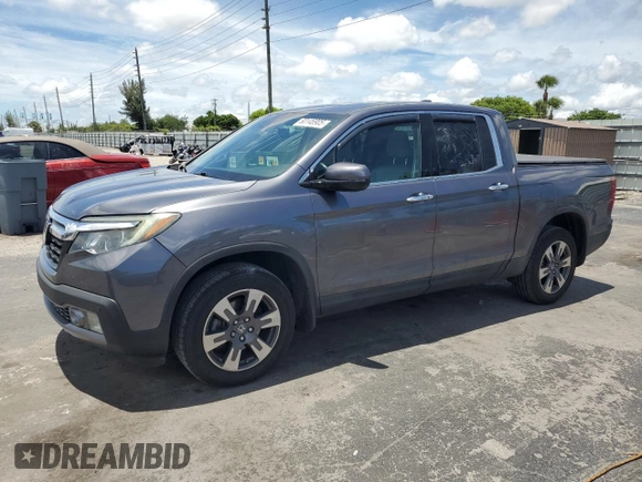 2017 Honda Ridgeline RTL-E with VIN 5FPYK3F74HB027130, listed as a Copart auction lot 60146905 with 99,964 mi miles and Salvage title. Bid and sale history available at DreamBid. Image 1.