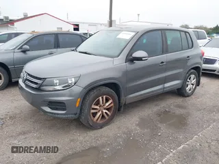 2012 Volkswagen Tiguan LE z VIN WVGAV7AX9CW096668, wystawiony jako IAAI lot #41664461 z przebiegiem 161 725 mil mil oraz . Historia ofert i sprzedaży dostępna na DreamBid. Obrazek 2.