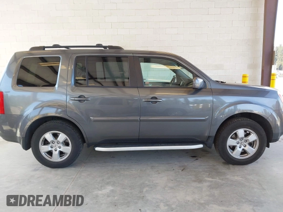 2011 Honda Pilot EX-L with VIN 5FNYF4H56BB503089, listed as a IAAI auction lot 42127543 with 144,227 mi miles. Bid and sale history available at carsss.com. Image 13.