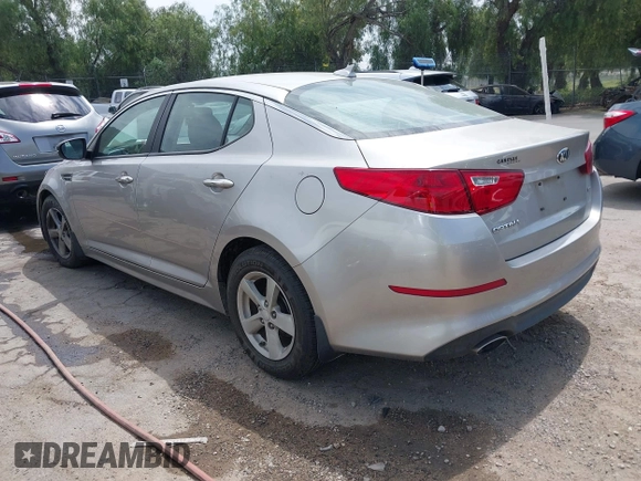 2014 Kia Optima LX with VIN KNAGM4A74E5489032, listed as a IAAI auction lot 41999733 with 83,998 mi miles. Bid and sale history available at carsss.com. Image 3.