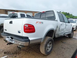 2001 Ford F-150 XLT with VIN 1FTRW08L71KF41847, listed as a IAAI auction lot 42379764 with Not provided miles and . Bid and sale history available at DreamBid. Image 4.
