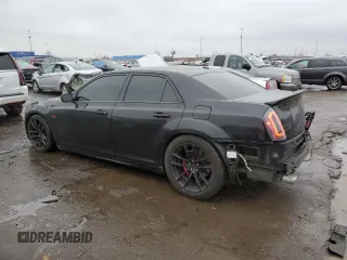 2012 Chrysler 300 SRT8 with VIN 2C3CCAFJ0CH801090, listed as a Copart auction lot 86537394 with 126,439 mi miles and Clean Title. Bid and sale history available at carsss.com. Image 2.