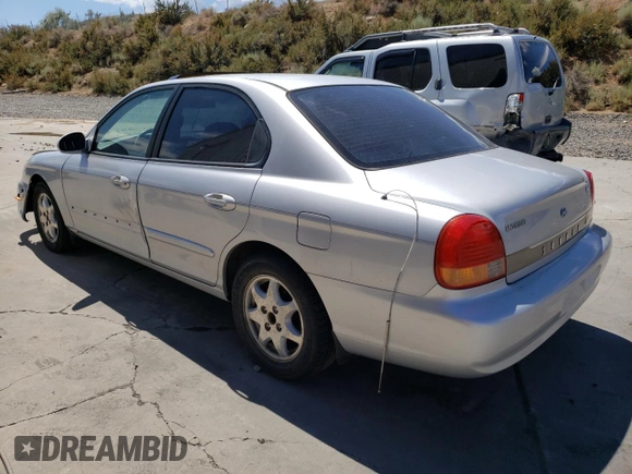 2001 Hyundai Sonata GLS with VIN KMHWF35V81A392523, listed as a Copart auction lot 74584334 with 174,597 mi miles and Salvage Title. Bid and sale history available at carsss.com. Image 2.