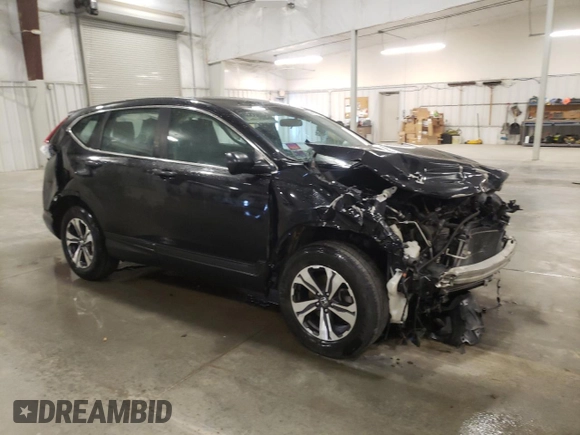 2017 Honda CR-V LX with VIN 5J6RW6H38HL004499, listed as a Copart auction lot 52412155 with 134,715 mi miles and Salvage Title. Bid and sale history available at DreamBid. Image 4.