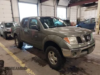 2005 Nissan Frontier 4WD LE with VIN 1N6AD07W95C411421, listed as a IAAI auction lot 41847242 with 209,816 mi miles. Bid and sale history available at carsss.com. Image 1.