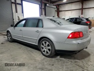 2004 Volkswagen Phaeton V8 z VIN WVWAF63D348007164, wystawiony jako Copart lot #45347815 z przebiegiem 141 934 mil mil oraz Szkody całkowita. Historia ofert i sprzedaży dostępna na DreamBid. Obrazek 2.