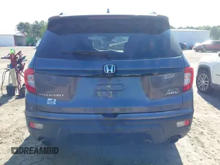 2019 Honda Passport Elite with VIN 5FNYF8H04KB004657, listed as a IAAI auction lot 41993974 with 90,964 mi miles and . Bid and sale history available at DreamBid. Image 16.