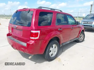 2011 Ford Escape XLT with VIN 1FMCU9D70BKC38169, listed as a IAAI auction lot 42802876 with 233,249 mi miles and . Bid and sale history available at DreamBid. Image 4.