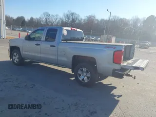 2014 Chevrolet Silverado 1500 LT with VIN 1GCVKREC0EZ162611, listed as a IAAI auction lot 41637456 with 162,637 mi miles and . Bid and sale history available at DreamBid. Image 3.