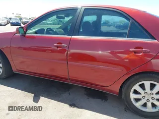 2002 Toyota Camry LE z VIN 4T1BE32K52U082454, wystawiony jako IAAI lot #42276881 z przebiegiem 225 814 mil mil oraz . Historia ofert i sprzedaży dostępna na DreamBid. Obrazek 14.