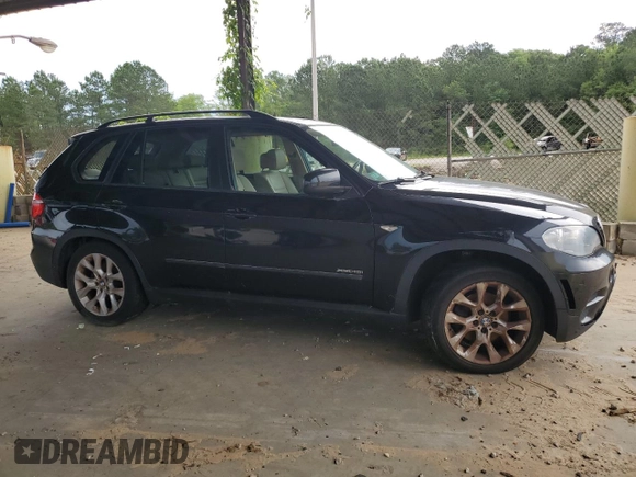 2012 BMW X5 35i with VIN 5UXZV4C54CL990112, listed as a Copart auction lot 59125245 with 142,742 mi miles and Clean title. Bid and sale history available at DreamBid. Image 4.