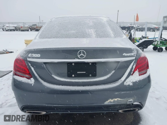 2017 Mercedes-Benz C 300 with VIN 55SWF4KB3HU215771, listed as a IAAI auction lot 41229717 with 66,676 mi miles and . Bid and sale history available at DreamBid. Image 16.