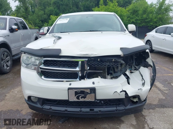 2012 Dodge Durango SXT with VIN 1C4RDJAG8CC336267, listed as a IAAI auction lot 42377138 with 179,555 mi miles and . Bid and sale history available at DreamBid. Image 6.