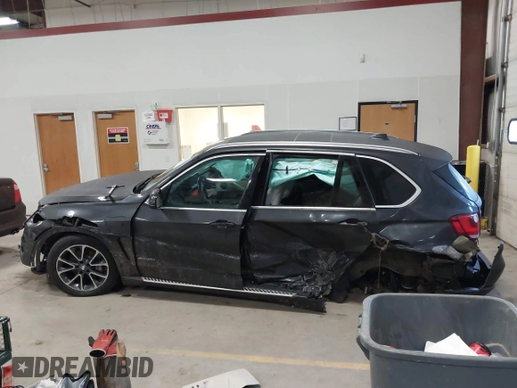 2016 BMW X5 xDrive40e with VIN 5UXKT0C55G0F75374, listed as a IAAI auction lot 41665965 with Not Provided miles and . Bid and sale history available at DreamBid. Image 13.