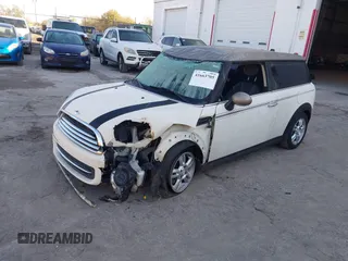 2013 MINI Clubman z VIN WMWZF3C54DT491236, wystawiony jako IAAI lot #41663705 z przebiegiem 90 046 mil mil oraz . Historia ofert i sprzedaży dostępna na DreamBid. Obrazek 17.