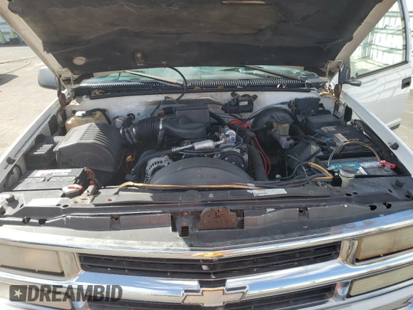 1999 Chevrolet Suburban with VIN 3GNEC16R5XG213001, listed as a Copart auction lot 43498865 with 236,306 mi miles and Salvage Title. Bid and sale history available at carsss.com. Image 12.
