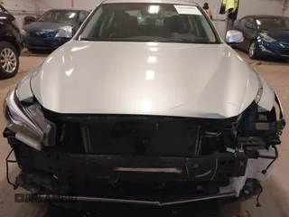 2015 Infiniti Q50 Premium with VIN JN1BV7AR3FM396154, listed as a IAAI auction lot 41978988 with 110,109 mi miles. Bid and sale history available at carsss.com. Image 12.