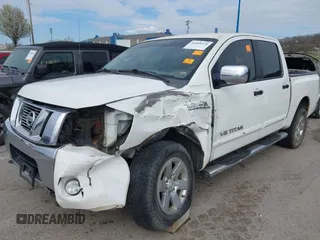 2011 Nissan Titan SL with VIN 1N6AA0EC7BN313599, listed as a IAAI auction lot 41888934 with 182,894 mi miles. Bid and sale history available at carsss.com. Image 2.