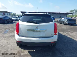 2013 Cadillac SRX Luxury Collection with VIN 3GYFNCE33DS608040, listed as a IAAI auction lot 41912860 with 128,295 mi miles. Bid and sale history available at carsss.com. Image 16.