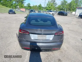 2022 Tesla Model S with VIN 5YJSA1E57NF479056, listed as a IAAI auction lot 42091009 with 78,272 mi miles and . Bid and sale history available at DreamBid. Image 16.