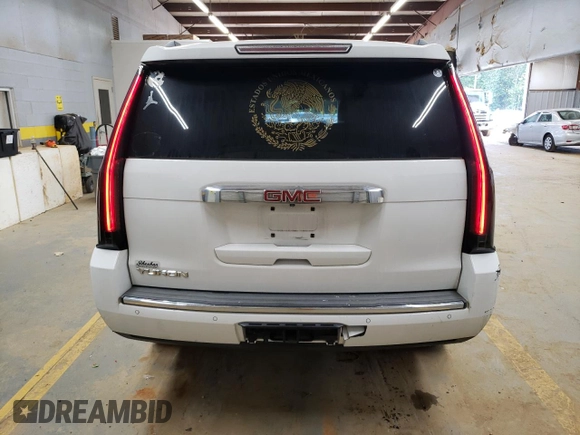 2015 GMC Yukon Denali with VIN 1GKS2CKJ1FR191804, listed as a Copart auction lot 68242514 with 250,403 mi miles and Salvage Title. Bid and sale history available at carsss.com. Image 6.