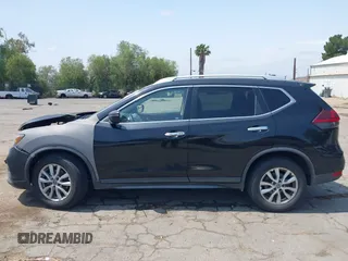 2019 Nissan Rogue SV with VIN KNMAT2MT5KP529742, listed as a IAAI auction lot 42412697 with 235,712 mi miles and . Bid and sale history available at DreamBid. Image 14.