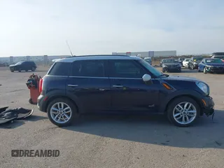 2013 MINI Countryman S ALL4 with VIN WMWZC5C58DWP33707, listed as a IAAI auction lot 41835234 with 98,441 mi miles and . Bid and sale history available at DreamBid. Image 13.