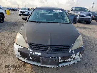 2006 Mitsubishi Lancer ES with VIN JA3AJ26E26U023604, listed as a Copart auction lot 59511315 with 267,581 mi miles and Salvage title. Bid and sale history available at DreamBid. Image 5.