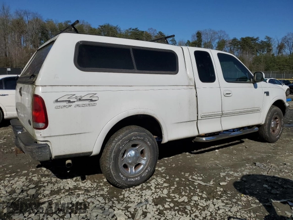 1999 Ford F-150 XL with VIN 1FTRX18L1XNB18305, listed as a Copart auction lot 51336985 with 173,904 mi miles and Clean Title. Bid and sale history available at carsss.com. Image 3.