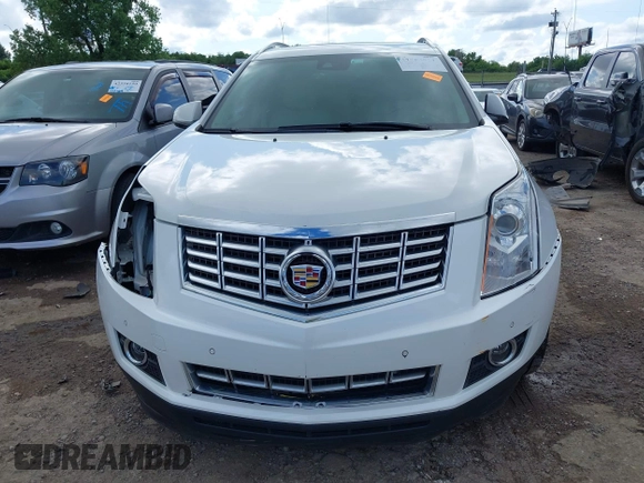 2015 Cadillac SRX Premium Collection with VIN 3GYFNDE37FS627697, listed as a IAAI auction lot 42354811 with 64,135 mi miles and . Bid and sale history available at DreamBid. Image 13.
